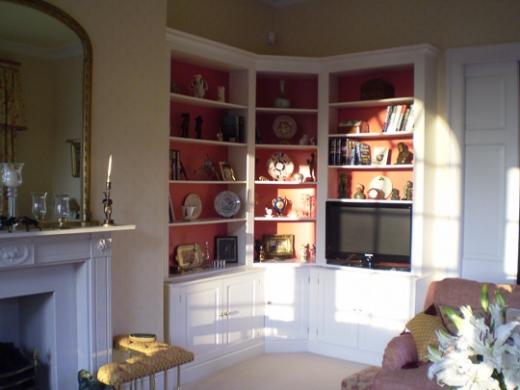 Fitted Corner Bookcase On Cupboard Base Paint Finish
