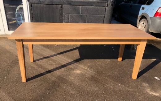 Large oak table on tapered legs
