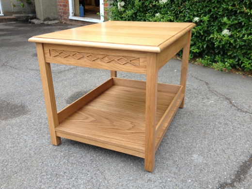 Oak Occasional Table With Lower Shelf And Carved Drawer